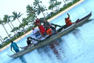 Honorees are brought to the event by the Anuenue Canoe Club. Pu ane Bell sounds the arrival by conch